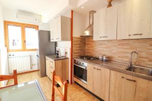 Kuchyň nebo kuchyňský kout v ubytování Casa Aisha a Otranto