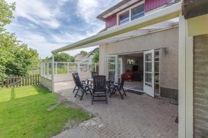 Zahrada ubytování Duinvilla Deluxe met Sauna en Whirpool - 6 personen