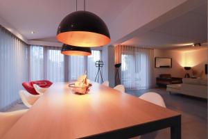 Postel nebo postele na pokoji v ubytování Duinvilla Deluxe met Sauna XL - 6 personen