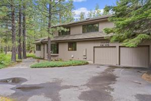 a house with a driveway in front of it at Glaze Meadow 376 in Black Butte Ranch