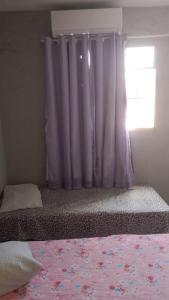 Postel nebo postele na pokoji v ubytování Pousada do Sol