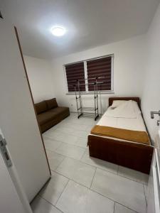 Postel nebo postele na pokoji v ubytování Apartman Ćorić