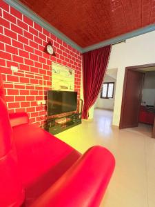 TV a/nebo společenská místnost v ubytování sahara dua jungle farmstay