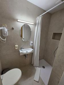 Koupelna v ubytování Hotel de France