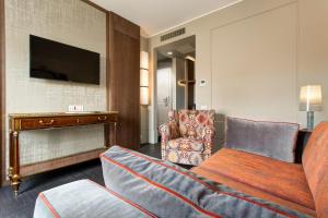 TV a/nebo společenská místnost v ubytování Mascagni Luxury Rooms & Suites