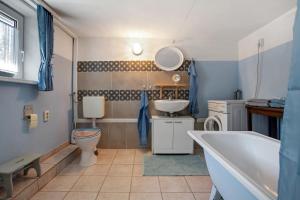 Ένα μπάνιο στο Ferienwohnung Alte Bauernkate +25 φωτογραφίες