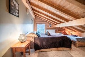 Postel nebo postele na pokoji v ubytování Chalet Célestine 7ch - '4 sdb'