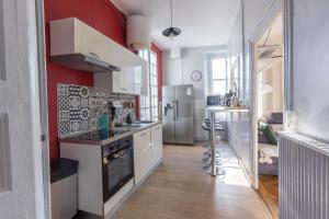 Kuchyň nebo kuchyňský kout v ubytování La Villa Barillerie - 24 pers - 1870 - Centre Ville