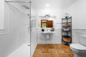 a bathroom with a shower and a sink and a toilet at Finca Especial El Pino en Esporles in Esporles +37 photos