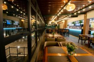 En restaurant eller et andet spisested på Oscar Inn Eco Resort