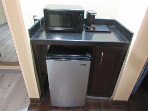 Kuchyň nebo kuchyňský kout v ubytování Best Western Kenner