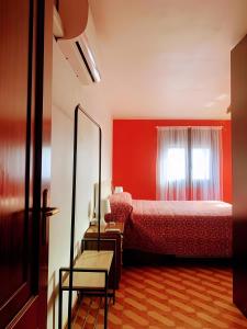 En eller flere senge i et værelse på Encantadora Boutique Home Villa