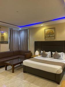 Katil atau katil-katil dalam bilik di Shores hotel & apartments