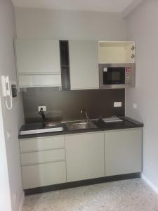 Kuchyň nebo kuchyňský kout v ubytování Casa Vacanze Roma