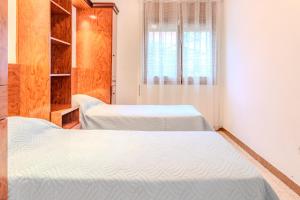 Postel nebo postele na pokoji v ubytování Casa Raymond con piscina + 21 fotografií