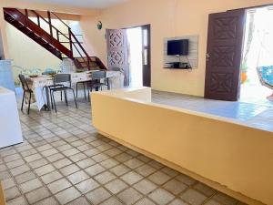 TV a/nebo společenská místnost v ubytování Casa de Praia Cascavel