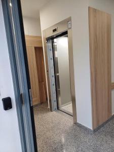 a glass door with a mirror in a room at Los Borgia in Viana