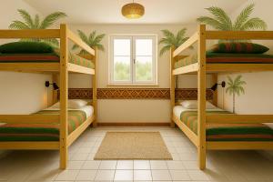 a room with two bunk beds and a window at Açaizeiro Hostel in Belém