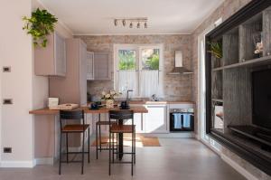 Kuchyň nebo kuchyňský kout v ubytování Casa Due Ulivi