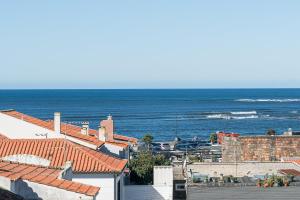 a view of the ocean from a building at GuestReady - Moledo's beach and sun in Santana