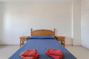 Ένα ή περισσότερα κρεβάτια σε δωμάτιο στο Isla 5