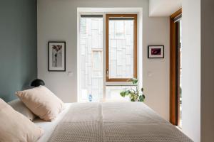 Postel nebo postele na pokoji v ubytování Premium city-center apartment in Oslo with a stunning balcony