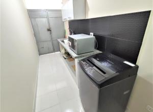 Kuchyň nebo kuchyňský kout v ubytování Hostal Center + 29 fotografií