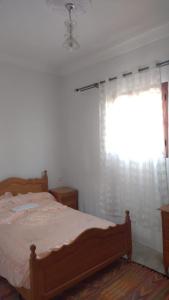 Postel nebo postele na pokoji v ubytování Serenity Guesthouse