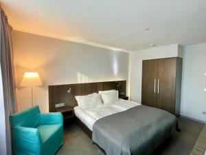 Postel nebo postele na pokoji v ubytování Elegantes Smart Apartment in Szene-Viertel + 11 fotografií