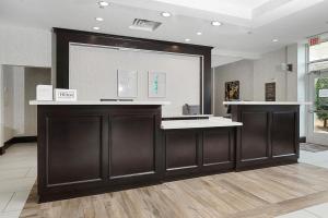 a large podium in a room with a large screen at Hilton Garden Inn New Braunfels in New Braunfels