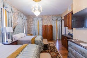 Postel nebo postele na pokoji v ubytování PA Smith Hotel