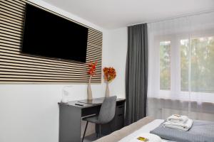 TV a/nebo společenská místnost v ubytování Modern Apartments Neuburg 6 - New