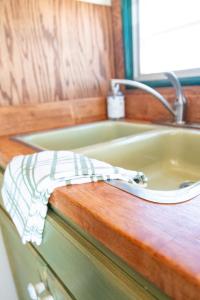 a kitchen counter with a sink and a sink at SS Mindy - A Unique Tombstone Stay in Tombstone