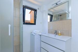 Koupelna v ubytování Loc Ty Home + 17 fotografií