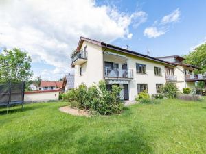 an exterior view of a house with a yard at Ferienhof Biegger in Tettnang