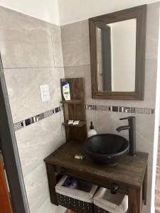 Koupelna v ubytování Cabaña El Quebrachal + 9 fotografií