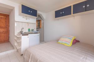 Kuchyň nebo kuchyňský kout v ubytování Porte Rouge 2