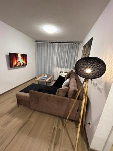 Posezení v ubytování 108 Lux Apartman