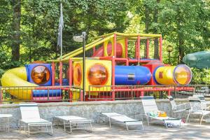 a brightly colored inflatable playground in a park at Shepherds Crook 1127 in Gatlinburg