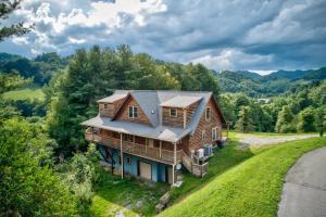 an overhead view of a log house on a hill at 1 Awesome Skyview in Vilas