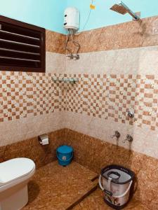 Koupelna v ubytování Pranavam Beach Homestay + 27 fotografií