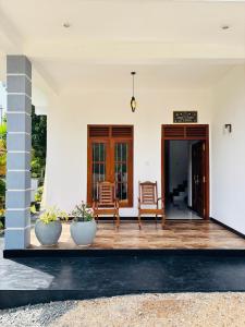 Patio nebo venkovní prostory v ubytování Eagle Wings Mirissa