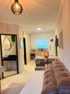 Χώρος καθιστικού στο IR 02 · Próximo ao hospital Hans Dieter / Térreo