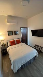 Ένα ή περισσότερα κρεβάτια σε δωμάτιο στο Modern Room-Gated Community