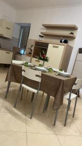 Køkken eller tekøkken på Casa vacanze Nunù