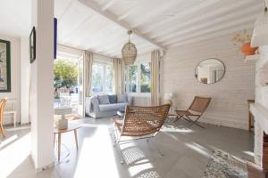 Posezení v ubytování Villa Claire à Andernos - sea view with heated poo + 39 fotografií