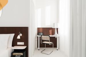 Postel nebo postele na pokoji v ubytování Ruby Giulia Hotel Rome + 73 fotografií