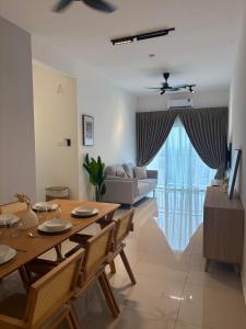 Χώρος καθιστικού στο muji house d'aman residence alor setar