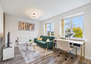 Et tv og/eller underholdning på Buckingham Apartment 2bd