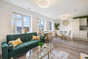 Et opholdsområde på Buckingham Apartment 2bd